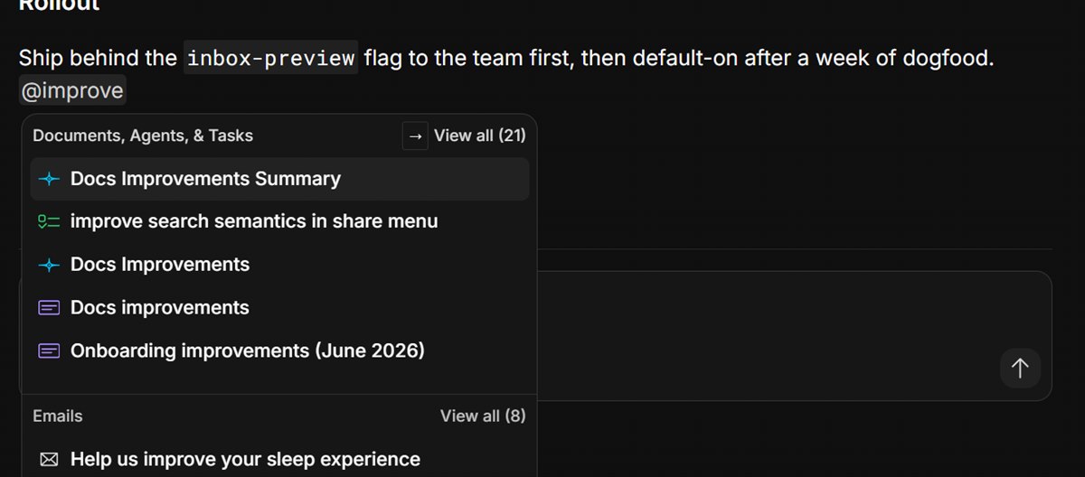 Typing @ in a Macro doc opens a picker listing documents, agent chats, tasks and emails to mention